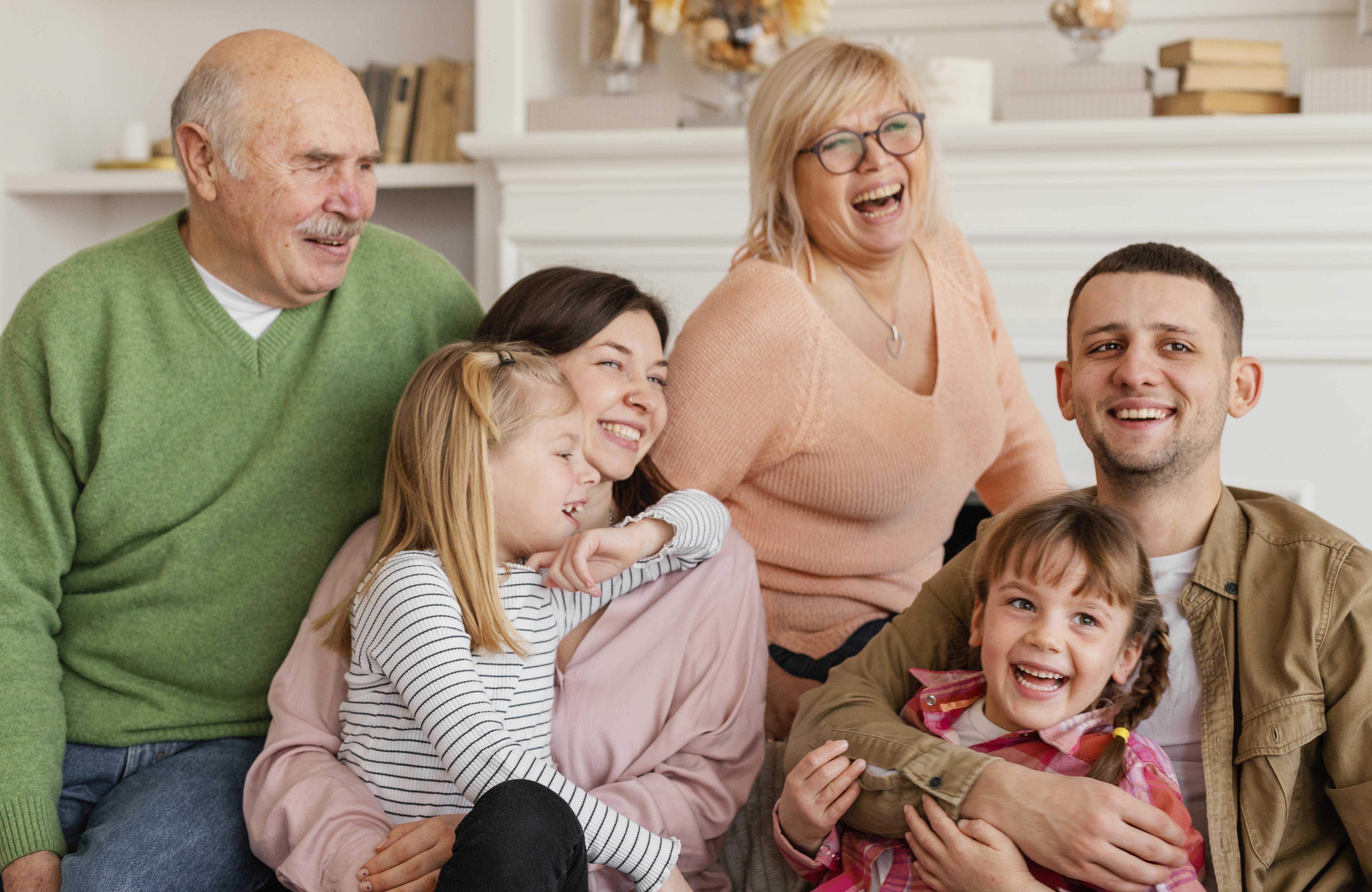 medium-shot-happy-family-indoors Solar North | How do I claim the £7500 BUS grant?